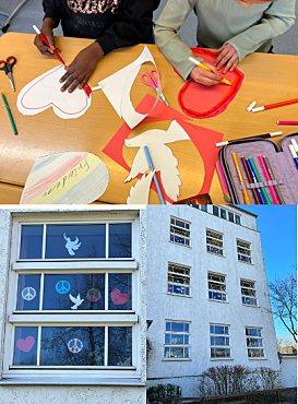 Schüler/ innen basteln Friedenssymbole. 